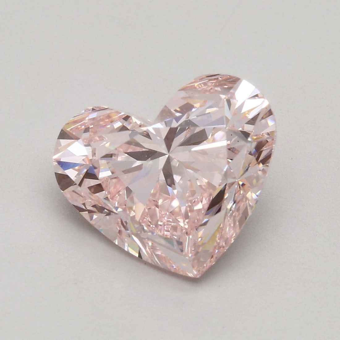 Loose Diamond - HEART 2.3ct Fancy Pink VS1: Loose Diamond - HEART 2.3ct Fancy Pink VS1 Source: This is a real non-mined Diamond that has been grown in a lab Shape: HEART Carats: 2.3 Color: Fancy Pink Certification: IGI Video: