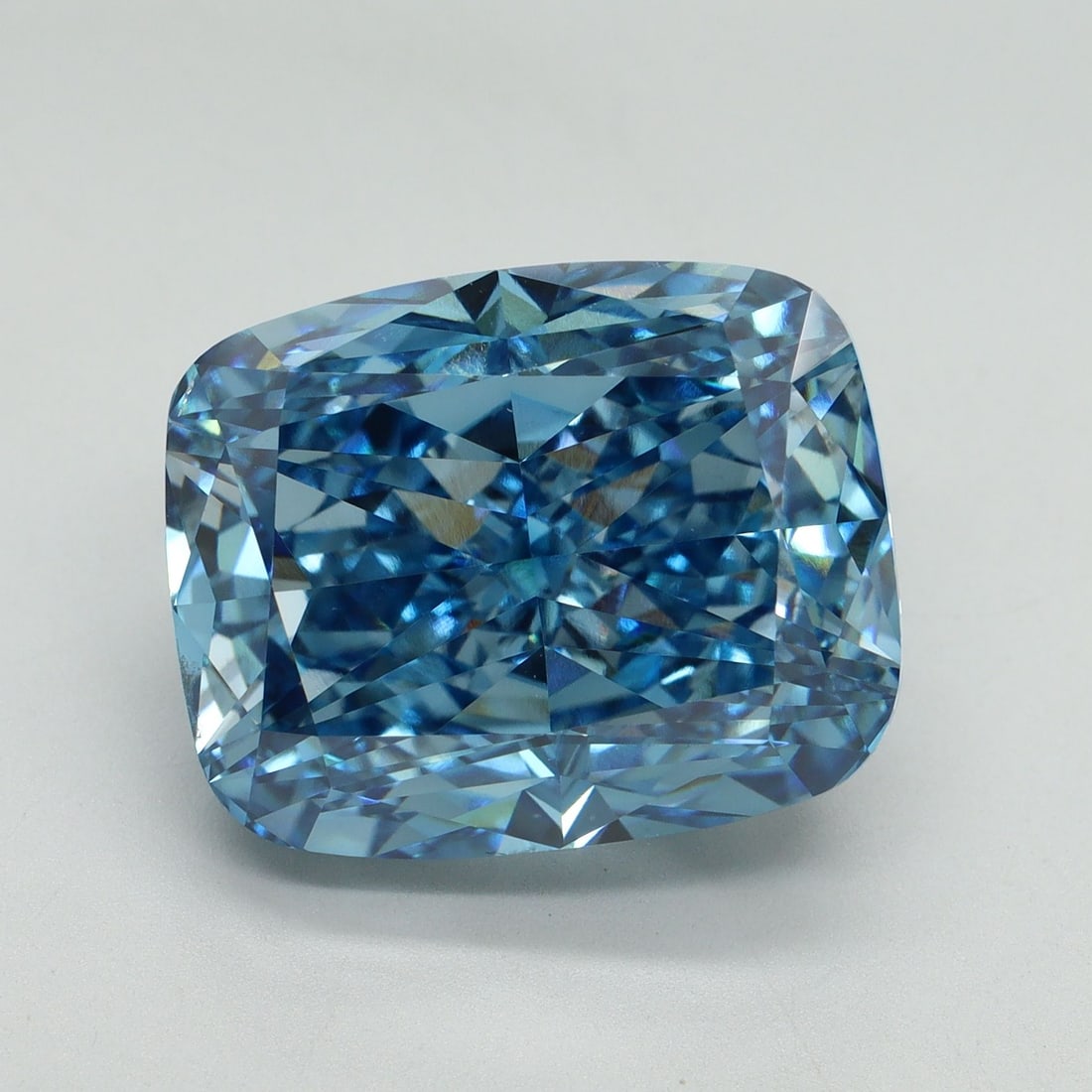 Loose Diamond - CUSHION MODIFIED 14.01ct Fancy Vivid Blue VS2: Loose Diamond - CUSHION MODIFIED 14.01ct Fancy Vivid Blue VS2 Source: This is a real non-mined Diamond that has been grown in a lab Shape: CUSHION MODIFIED Carats: 14.01 Color: Fancy Vivid Blue Certif