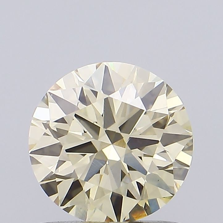 Loose Diamond - ROUND 0.57ct Fancy Vivid Yellow VS1: Loose Diamond - ROUND 0.57ct Fancy Vivid Yellow VS1 Source: This is a real non-mined Diamond that has been grown in a lab Shape: ROUND Carats: 0.57 Color: Fancy Vivid Yellow Certification: NONE Video: