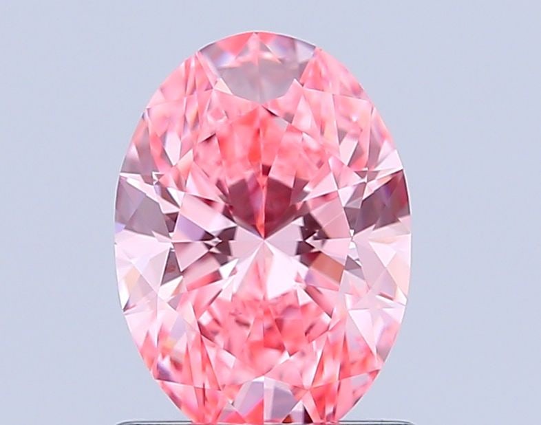 Loose Diamond - OVAL 1.01ct Fancy Vivid Pink VVS2: Loose Diamond - OVAL 1.01ct Fancy Vivid Pink VVS2 Source: This is a real non-mined Diamond that has been grown in a lab Shape: OVAL Carats: 1.01 Color: Fancy Vivid Pink Certification: IGI Video: