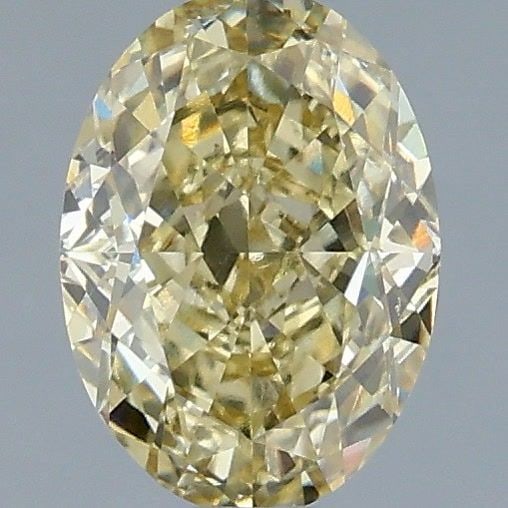 Loose Diamond - OVAL 1.05ct Fancy Yellow VVS2: Loose Diamond - OVAL 1.05ct Fancy Yellow VVS2 Source: This is a real non-mined Diamond that has been grown in a lab Shape: OVAL Carats: 1.05 Color: Fancy Yellow Certification: IGI Video: