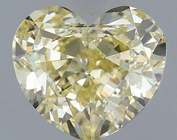 Loose Diamond - HEART 1.1ct Fancy Light Yellow VS2: Loose Diamond - HEART 1.1ct Fancy Light Yellow VS2 Source: This is a real non-mined Diamond that has been grown in a lab Shape: HEART Carats: 1.1 Color: Fancy Light Yellow Certification: IGI Video: