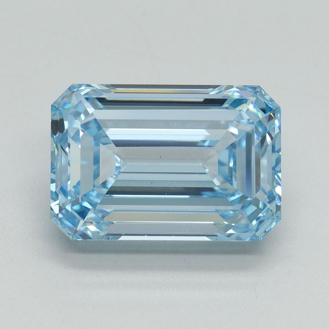 Loose Diamond - EMERALD 5.09ct Fancy Intense Blue VS1: Loose Diamond - EMERALD 5.09ct Fancy Intense Blue VS1 Source: This is a real non-mined Diamond that has been grown in a lab Shape: EMERALD Carats: 5.09 Color: Fancy Intense Blue Certification: IGI Vid
