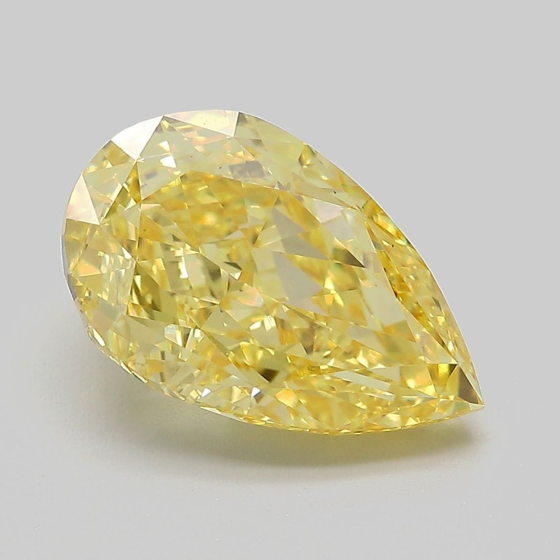 Loose Diamond - PEAR 5.27ct Fancy Vivid Yellow VS1: Loose Diamond - PEAR 5.27ct Fancy Vivid Yellow VS1 Source: This is a real non-mined Diamond that has been grown in a lab Shape: PEAR Carats: 5.27 Color: Fancy Vivid Yellow Certification: IGI Video: