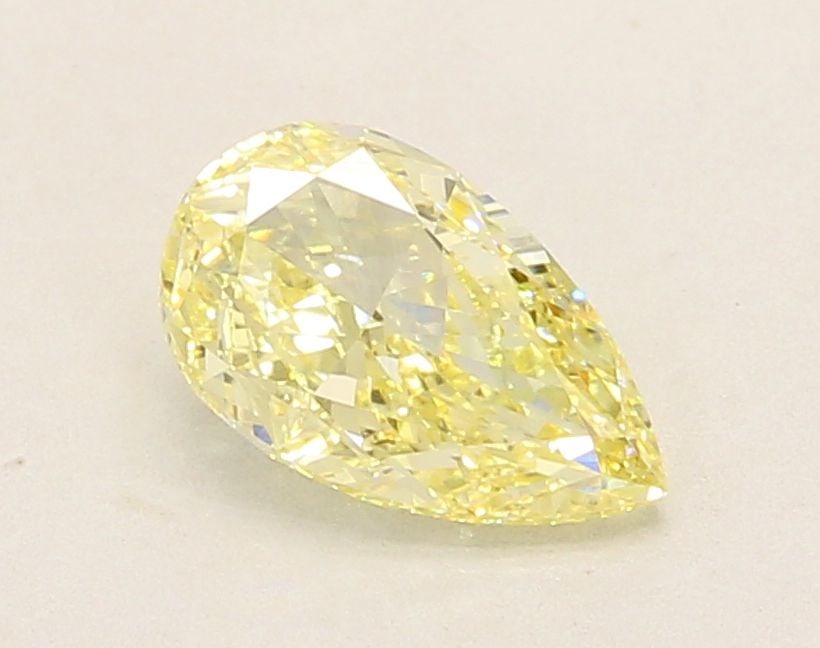 Loose Diamond - PEAR 1.53ct Fancy Yellow VVS2: Loose Diamond - PEAR 1.53ct Fancy Yellow VVS2 Source: This is a real non-mined Diamond that has been grown in a lab Shape: PEAR Carats: 1.53 Color: Fancy Yellow Certification: IGI Video: