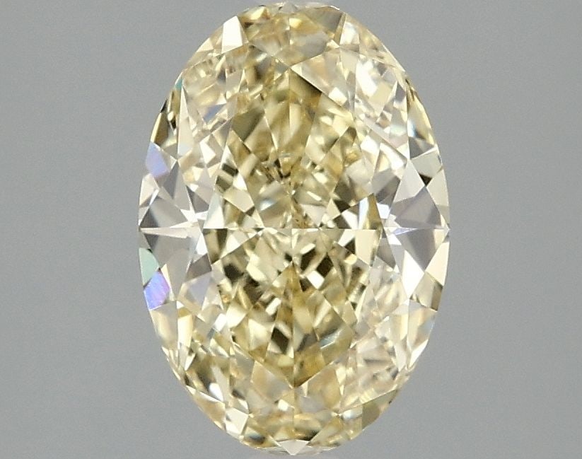 Loose Diamond - OVAL 2.1ct Fancy Intense Yellow VVS2: Loose Diamond - OVAL 2.1ct Fancy Intense Yellow VVS2 Source: This is a real non-mined Diamond that has been grown in a lab Shape: OVAL Carats: 2.1 Color: Fancy Intense Yellow Certification: IGI Video: