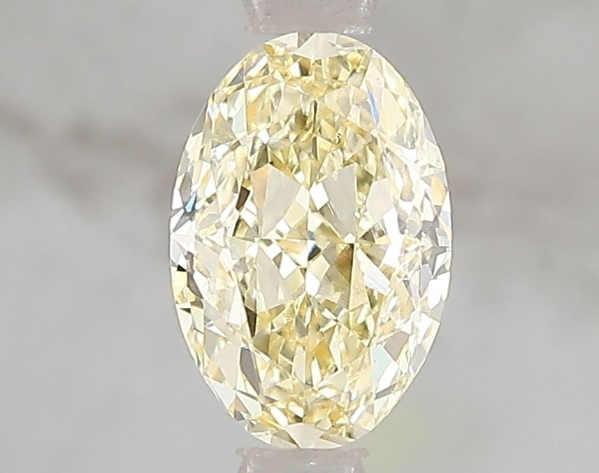 Loose Diamond - OVAL 1.5ct Fancy Intense Yellow VS1: Loose Diamond - OVAL 1.5ct Fancy Intense Yellow VS1 Source: This is a real non-mined Diamond that has been grown in a lab Shape: OVAL Carats: 1.5 Color: Fancy Intense Yellow Certification: IGI Video: