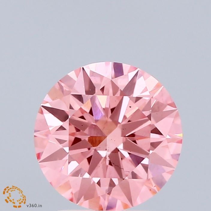 Ideal Loose Diamond - ROUND 2.07ct Fancy Vivid Pink VS2: Ideal Loose Diamond - ROUND 2.07ct Fancy Vivid Pink VS2 Source: This is a real non-mined Diamond that has been grown in a lab Shape: ROUND Carats: 2.07 Color: Fancy Vivid Pink Certification: IGI