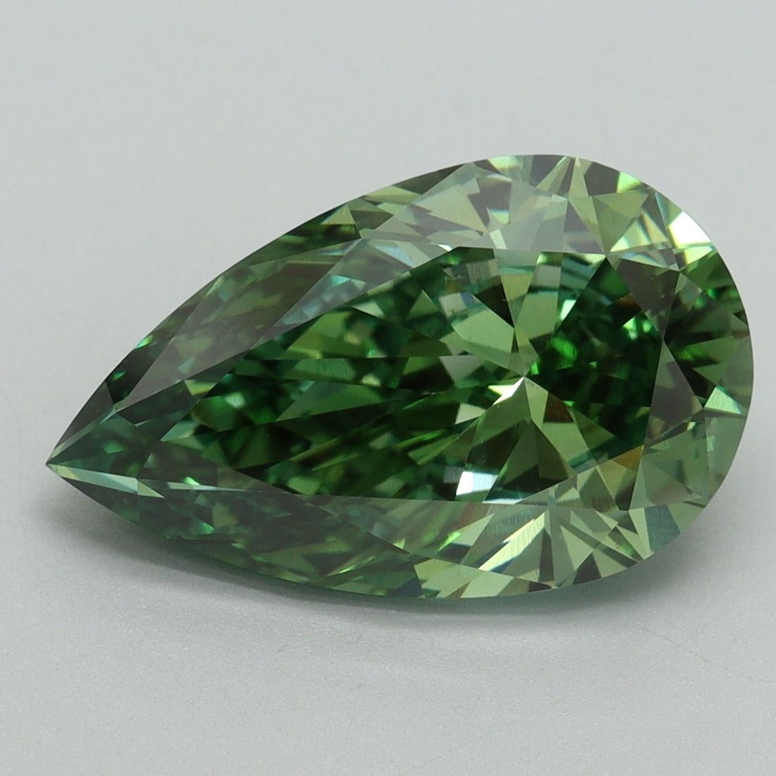 Loose Diamond - PEAR 5.1ct Fancy Vivid Green VS2: Loose Diamond - PEAR 5.1ct Fancy Vivid Green VS2 Source: This is a real non-mined Diamond that has been grown in a lab Shape: PEAR Carats: 5.1 Color: Fancy Vivid Green Certification: IGI Video: