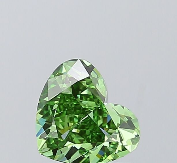 Loose Diamond - HEART 0.91ct Fancy Vivid Green VS1: Loose Diamond - HEART 0.91ct Fancy Vivid Green VS1 Source: This is a real non-mined Diamond that has been grown in a lab Shape: HEART Carats: 0.91 Color: Fancy Vivid Green Certification: IGI Video: