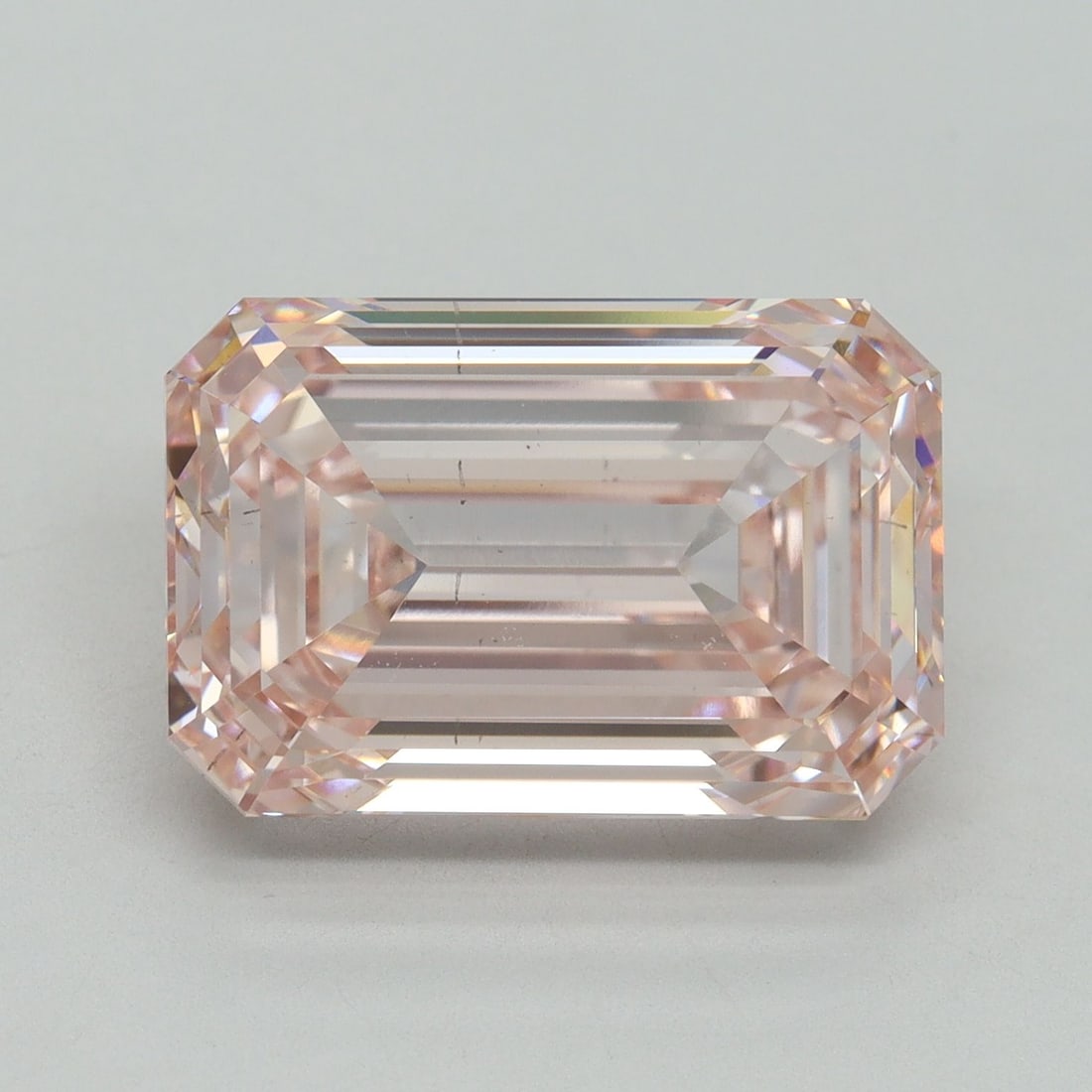Loose Diamond - EMERALD 9.7ct Fancy Intense Pink VS2: Loose Diamond - EMERALD 9.7ct Fancy Intense Pink VS2 Source: This is a real non-mined Diamond that has been grown in a lab Shape: EMERALD Carats: 9.7 Color: Fancy Intense Pink Certification: IGI Video