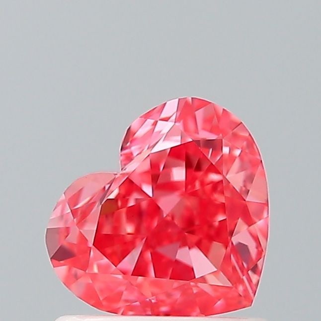 Loose Diamond - HEART 1.01ct Fancy Vivid Pink VVS2: Loose Diamond - HEART 1.01ct Fancy Vivid Pink VVS2 Source: This is a real non-mined Diamond that has been grown in a lab Shape: HEART Carats: 1.01 Color: Fancy Vivid Pink Certification: IGI Video: