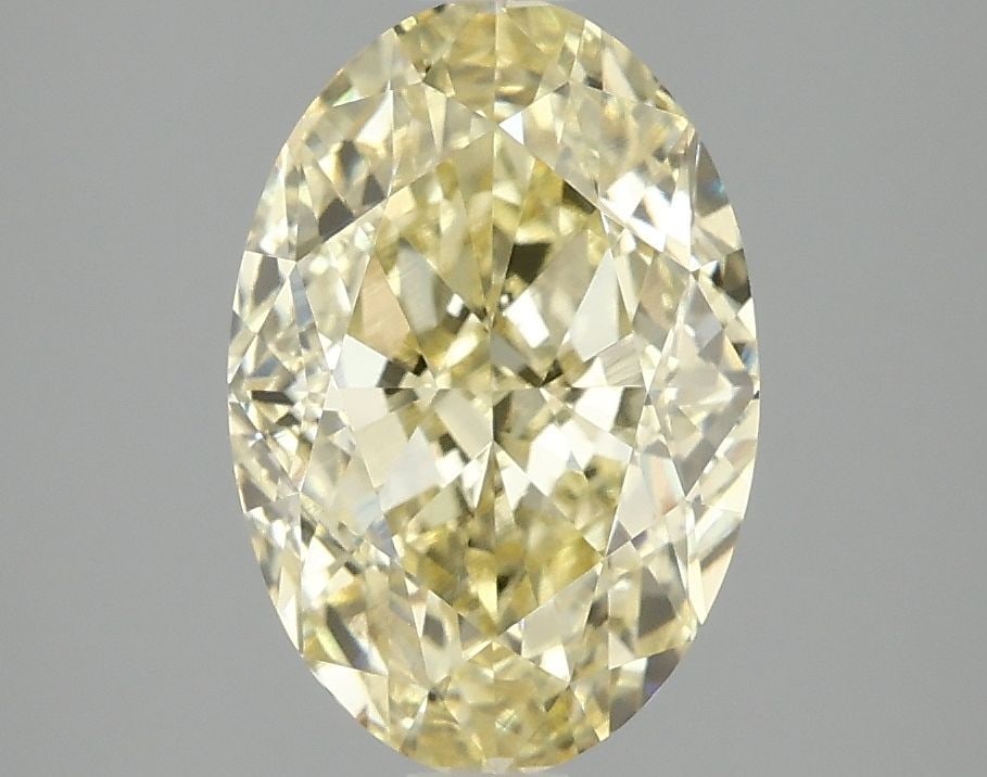 Loose Diamond - OVAL 3.01ct Fancy Intense Yellow VVS2: Loose Diamond - OVAL 3.01ct Fancy Intense Yellow VVS2 Source: This is a real non-mined Diamond that has been grown in a lab Shape: OVAL Carats: 3.01 Color: Fancy Intense Yellow Certification: IGI Vide