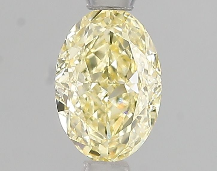 Loose Diamond - OVAL 1.01ct Fancy Intense Yellow VS2: Loose Diamond - OVAL 1.01ct Fancy Intense Yellow VS2 Source: This is a real non-mined Diamond that has been grown in a lab Shape: OVAL Carats: 1.01 Color: Fancy Intense Yellow Certification: IGI Video