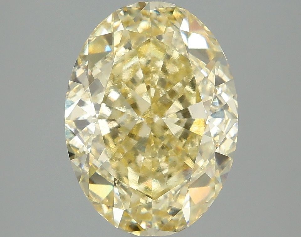 Loose Diamond - OVAL 4.06ct Fancy Intense Yellow VVS2: Loose Diamond - OVAL 4.06ct Fancy Intense Yellow VVS2 Source: This is a real non-mined Diamond that has been grown in a lab Shape: OVAL Carats: 4.06 Color: Fancy Intense Yellow Certification: IGI Vide