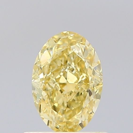 Loose Diamond - OVAL 0.73ct Fancy Yellow VVS2: Loose Diamond - OVAL 0.73ct Fancy Yellow VVS2 Source: This is a real non-mined Diamond that has been grown in a lab Shape: OVAL Carats: 0.73 Color: Fancy Yellow Certification: IGI Video: