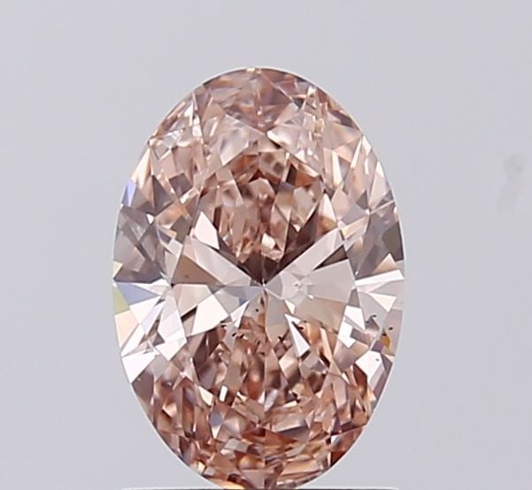 Loose Diamond - OVAL 0.98ct Fancy Brownish Pink VS2: Loose Diamond - OVAL 0.98ct Fancy Brownish Pink VS2 Source: This is a real non-mined Diamond that has been grown in a lab Shape: OVAL Carats: 0.98 Color: Fancy Brownish Pink Certification: IGI Video: