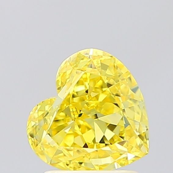 Loose Diamond - HEART 1.59ct Fancy Vivid Yellow VVS1: Loose Diamond - HEART 1.59ct Fancy Vivid Yellow VVS1 Source: This is a real non-mined Diamond that has been grown in a lab Shape: HEART Carats: 1.59 Color: Fancy Vivid Yellow Certification: IGI