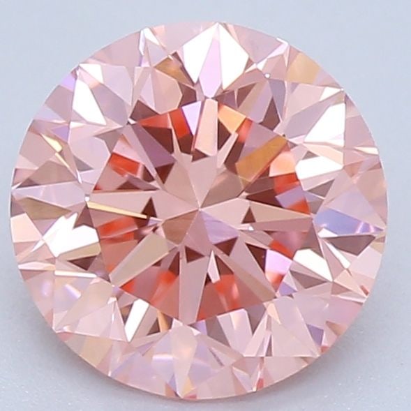 Loose Diamond - ROUND 0.93ct Fancy Vivid Pink VVS2: Loose Diamond - ROUND 0.93ct Fancy Vivid Pink VVS2 Source: This is a real non-mined Diamond that has been grown in a lab Shape: ROUND Carats: 0.93 Color: Fancy Vivid Pink Certification: IGI Video: