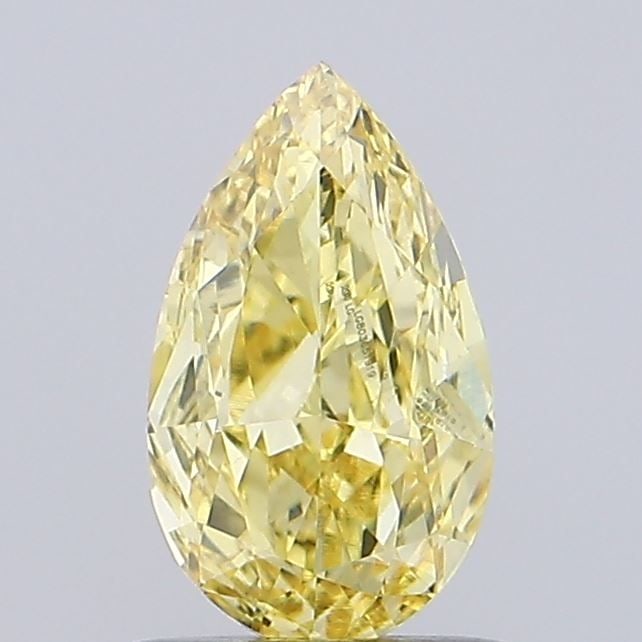 Loose Diamond - PEAR 1.0ct Fancy Vivid Yellow VVS2: Loose Diamond - PEAR 1.0ct Fancy Vivid Yellow VVS2 Source: This is a real non-mined Diamond that has been grown in a lab Shape: PEAR Carats: 1.0 Color: Fancy Vivid Yellow Certification: IGI Video:
