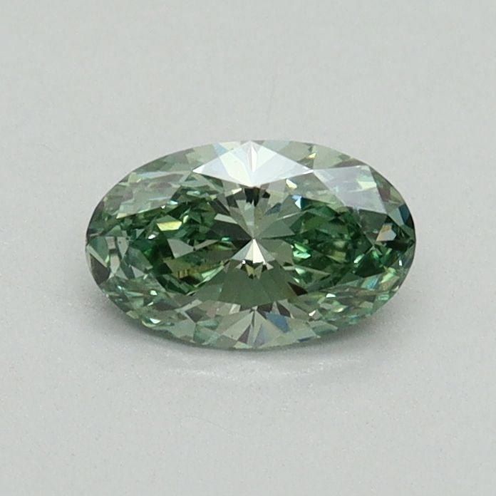 Loose Diamond - OVAL 0.41ct Fancy Vivid Green VS1: Loose Diamond - OVAL 0.41ct Fancy Vivid Green VS1 Source: This is a real non-mined Diamond that has been grown in a lab Shape: OVAL Carats: 0.41 Color: Fancy Vivid Green Certification: IGI Video: