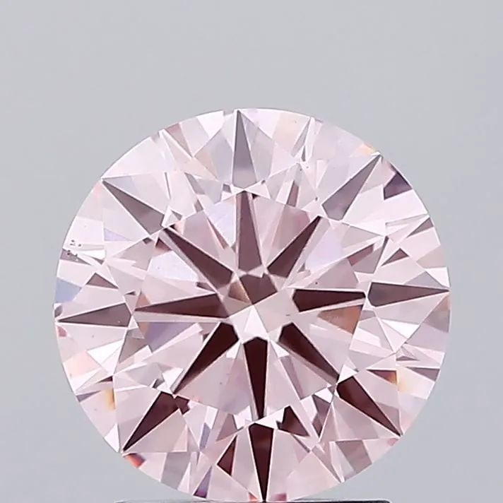 Ideal Loose Diamond - ROUND 2.28ct Fancy Vivid Pink VS1: Ideal Loose Diamond - ROUND 2.28ct Fancy Vivid Pink VS1 Source: This is a real non-mined Diamond that has been grown in a lab Shape: ROUND Carats: 2.28 Color: Fancy Vivid Pink Certification: IGI Video