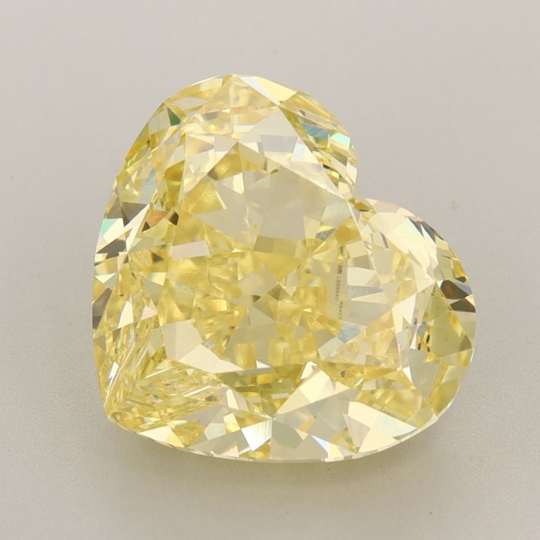 Loose Diamond - HEART 6.52ct Fancy Vivid Yellow VVS2: Loose Diamond - HEART 6.52ct Fancy Vivid Yellow VVS2 Source: This is a real non-mined Diamond that has been grown in a lab Shape: HEART Carats: 6.52 Color: Fancy Vivid Yellow Certification: IGI