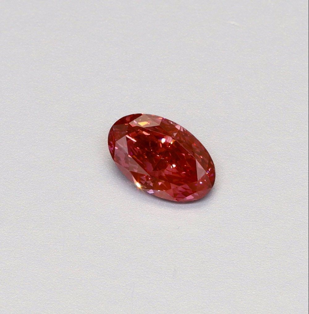 Loose Diamond - OVAL 1.01ct Fancy Vivid Pink VS2: Loose Diamond - OVAL 1.01ct Fancy Vivid Pink VS2 Source: This is a real non-mined Diamond that has been grown in a lab Shape: OVAL Carats: 1.01 Color: Fancy Vivid Pink Certification: IGI Video: