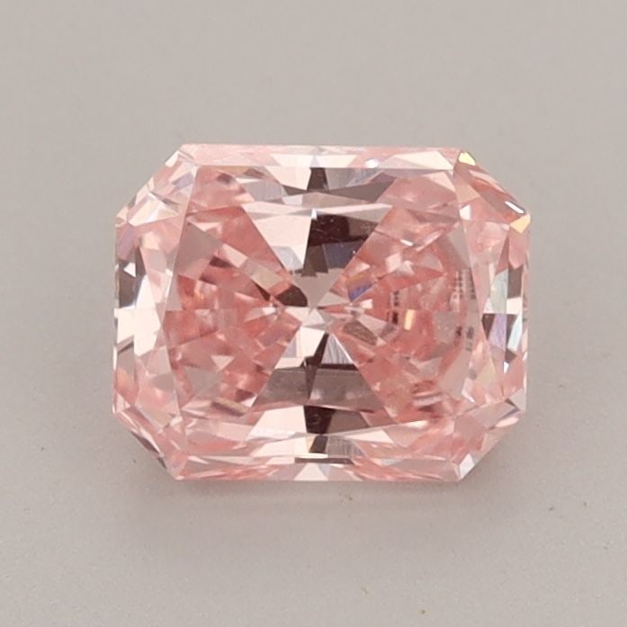 Loose Diamond - RADIANT 0.88ct Fancy Vivid Pink VS2: Loose Diamond - RADIANT 0.88ct Fancy Vivid Pink VS2 Source: This is a real non-mined Diamond that has been grown in a lab Shape: RADIANT Carats: 0.88 Color: Fancy Vivid Pink Certification: IGI Video: