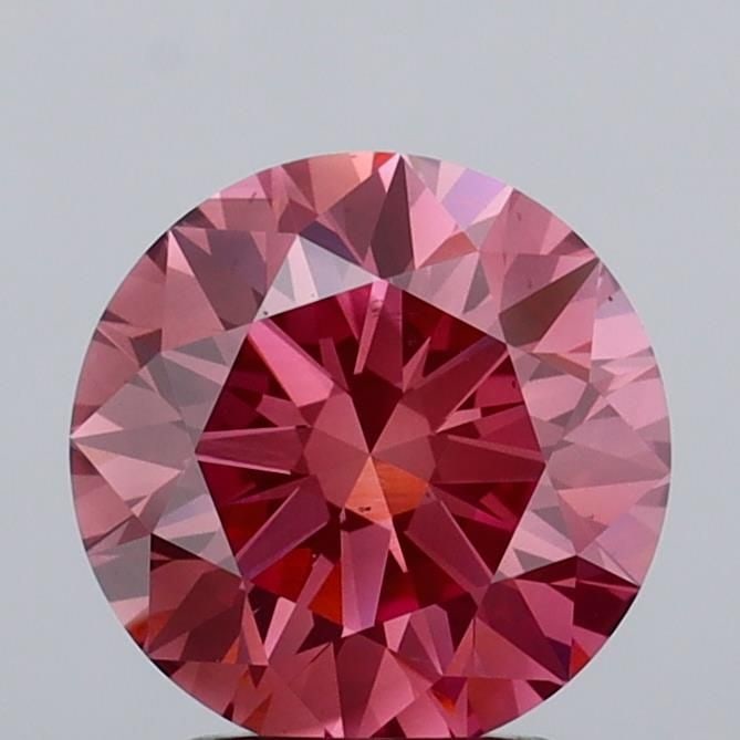 Ideal Loose Diamond - ROUND 2.52ct Fancy Vivid Pink VS1: Ideal Loose Diamond - ROUND 2.52ct Fancy Vivid Pink VS1 Source: This is a real non-mined Diamond that has been grown in a lab Shape: ROUND Carats: 2.52 Color: Fancy Vivid Pink Certification: IGI Video