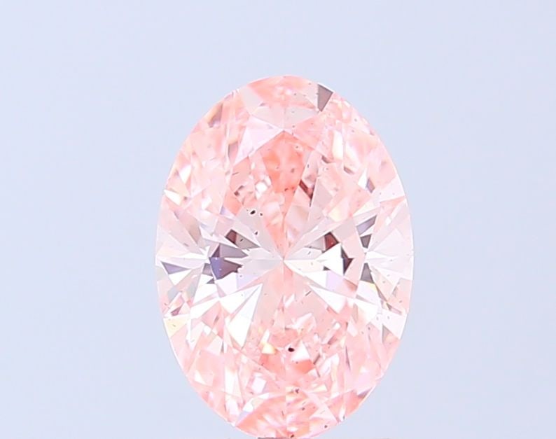 Loose Diamond - OVAL 1.56ct Fancy Vivid Pink SI1: Loose Diamond - OVAL 1.56ct Fancy Vivid Pink SI1 Source: This is a real non-mined Diamond that has been grown in a lab Shape: OVAL Carats: 1.56 Color: Fancy Vivid Pink Certification: IGI Video: