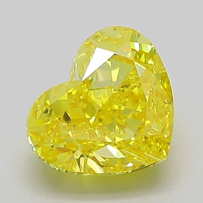 Loose Diamond - HEART 1.61ct Fancy Vivid Yellow VVS2: Loose Diamond - HEART 1.61ct Fancy Vivid Yellow VVS2 Source: This is a real non-mined Diamond that has been grown in a lab Shape: HEART Carats: 1.61 Color: Fancy Vivid Yellow Certification: IGI Video: