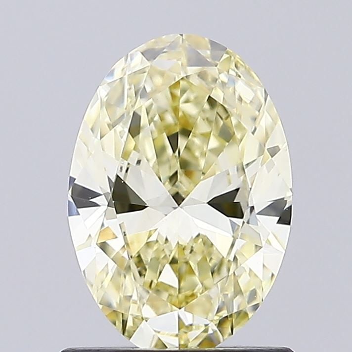 Loose Diamond - OVAL 1.0ct Fancy Yellow VS1: Loose Diamond - OVAL 1.0ct Fancy Yellow VS1 Source: This is a real non-mined Diamond that has been grown in a lab Shape: OVAL Carats: 1.0 Color: Fancy Yellow Certification: IGI Video: