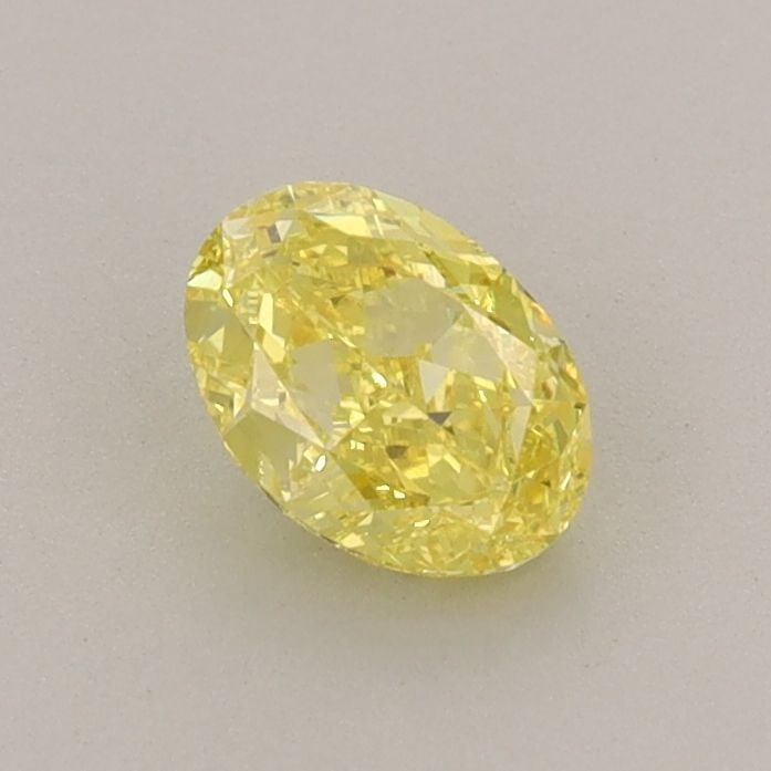 Loose Diamond - OVAL 0.61ct Fancy Vivid Yellow VVS2: Loose Diamond - OVAL 0.61ct Fancy Vivid Yellow VVS2 Source: This is a real non-mined Diamond that has been grown in a lab Shape: OVAL Carats: 0.61 Color: Fancy Vivid Yellow Certification: IGI Video: