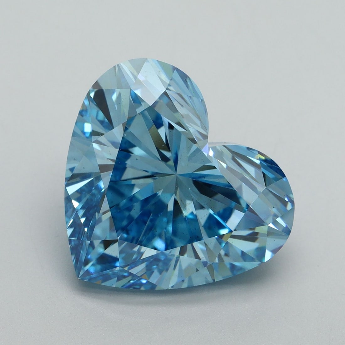 Loose Diamond - HEART 10.04ct Fancy Vivid Blue VS1: Loose Diamond - HEART 10.04ct Fancy Vivid Blue VS1 Source: This is a real non-mined Diamond that has been grown in a lab Shape: HEART Carats: 10.04 Color: Fancy Vivid Blue Certification: IGI Video: