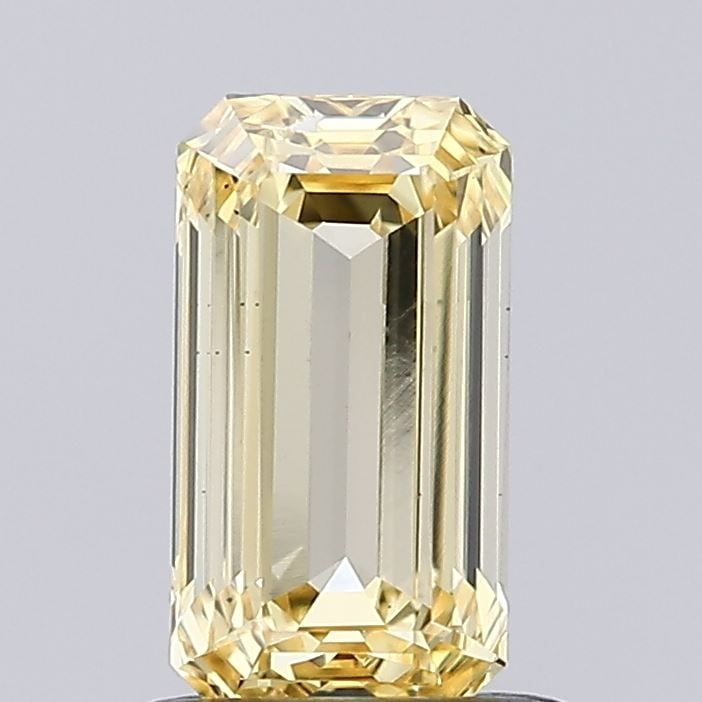 Loose Diamond - EMERALD 0.87ct Fancy Yellow VS1: Loose Diamond - EMERALD 0.87ct Fancy Yellow VS1 Source: This is a real non-mined Diamond that has been grown in a lab Shape: EMERALD Carats: 0.87 Color: Fancy Yellow Certification: IGI Video: