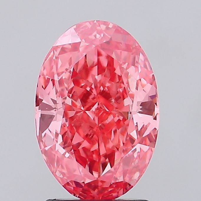Loose Diamond - OVAL 2.04ct Fancy Vivid Pink VVS2: Loose Diamond - OVAL 2.04ct Fancy Vivid Pink VVS2 Source: This is a real non-mined Diamond that has been grown in a lab Shape: OVAL Carats: 2.04 Color: Fancy Vivid Pink Certification: IGI Video: