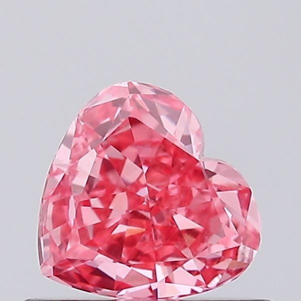 Loose Diamond - HEART 0.41ct Fancy Vivid Pink VVS2: Loose Diamond - HEART 0.41ct Fancy Vivid Pink VVS2 Source: This is a real non-mined Diamond that has been grown in a lab Shape: HEART Carats: 0.41 Color: Fancy Vivid Pink Certification: IGI Video: