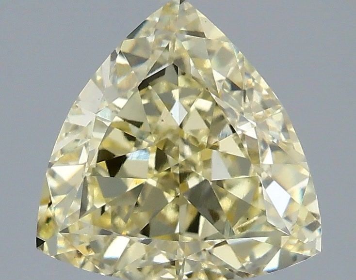 Loose Diamond - TRIANGULAR 2.56ct Fancy Yellow VS1: Loose Diamond - TRIANGULAR 2.56ct Fancy Yellow VS1 Source: This is a real non-mined Diamond that has been grown in a lab Shape: TRIANGULAR Carats: 2.56 Color: Fancy Yellow Certification: IGI Video: