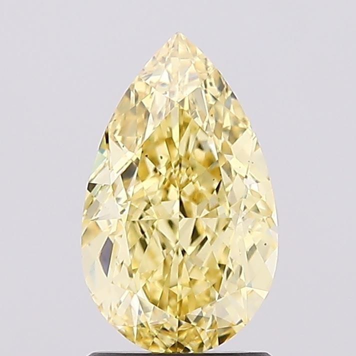 Loose Diamond - PEAR 1.73ct Fancy Vivid Yellow VS2: Loose Diamond - PEAR 1.73ct Fancy Vivid Yellow VS2 Source: This is a real non-mined Diamond that has been grown in a lab Shape: PEAR Carats: 1.73 Color: Fancy Vivid Yellow Certification: IGI Video:
