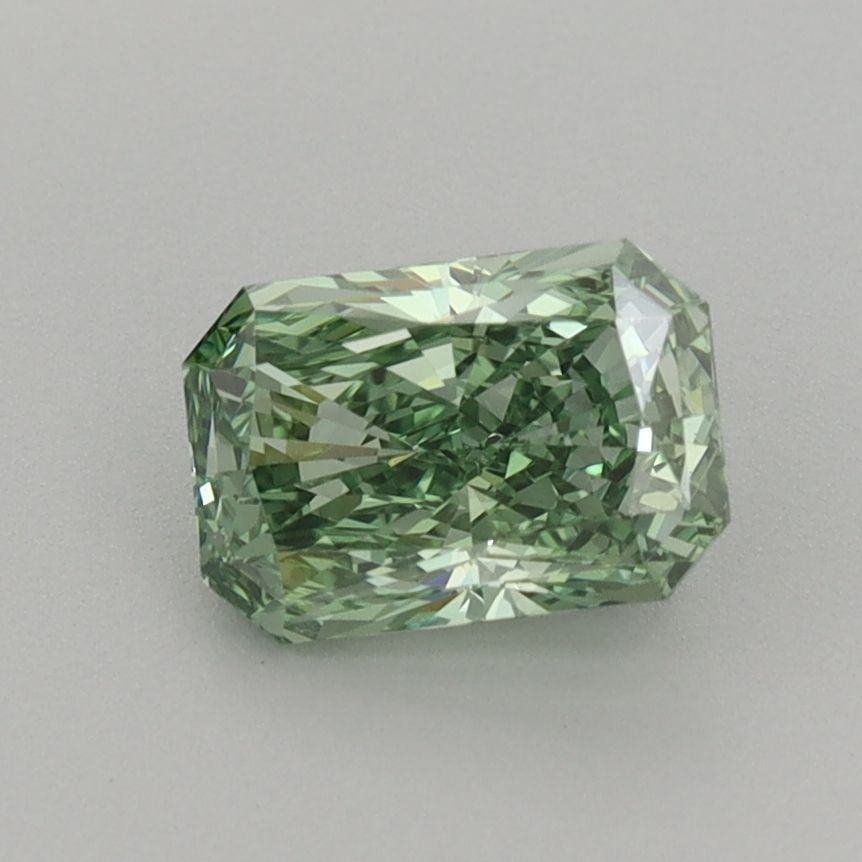 Loose Diamond - RADIANT 1.06ct Fancy Vivid Green VVS2: Loose Diamond - RADIANT 1.06ct Fancy Vivid Green VVS2 Source: This is a real non-mined Diamond that has been grown in a lab Shape: RADIANT Carats: 1.06 Color: Fancy Vivid Green Certification: IGI Vide