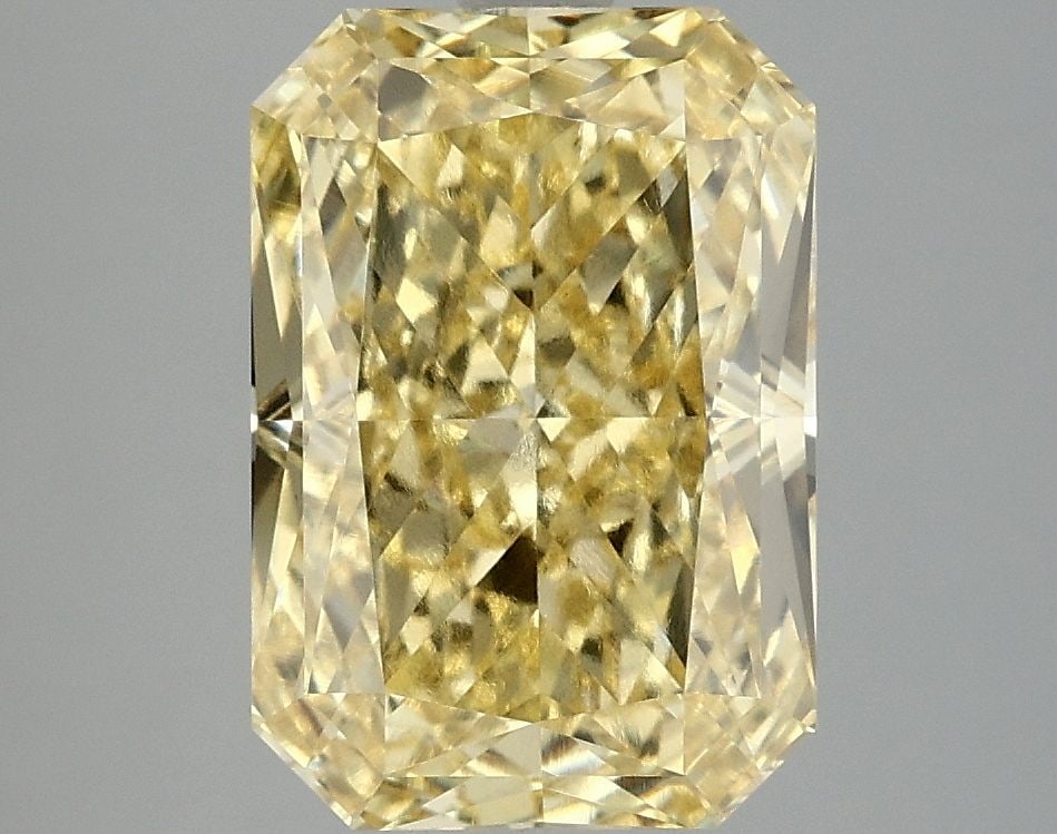 Loose Diamond - RADIANT 4.06ct Fancy Vivid Yellow VVS2: Loose Diamond - RADIANT 4.06ct Fancy Vivid Yellow VVS2 Source: This is a real non-mined Diamond that has been grown in a lab Shape: RADIANT Carats: 4.06 Color: Fancy Vivid Yellow Certification: IGI Vi