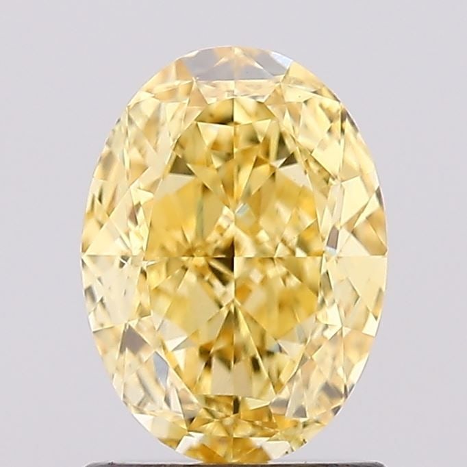 Loose Diamond - OVAL 1.25ct Fancy Vivid Yellow VS2: Loose Diamond - OVAL 1.25ct Fancy Vivid Yellow VS2 Source: This is a real non-mined Diamond that has been grown in a lab Shape: OVAL Carats: 1.25 Color: Fancy Vivid Yellow Certification: IGI Video: