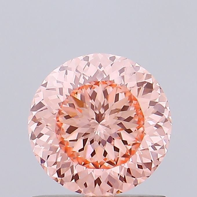 Loose Diamond - ROUND 1.04ct Fancy Vivid Pink VVS2: Loose Diamond - ROUND 1.04ct Fancy Vivid Pink VVS2 Source: This is a real non-mined Diamond that has been grown in a lab Shape: ROUND Carats: 1.04 Color: Fancy Vivid Pink Certification: IGI Video: