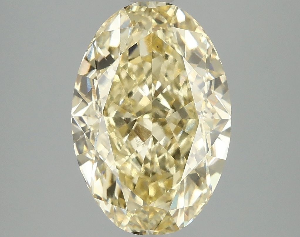 Loose Diamond - OVAL 4.1ct Fancy Vivid Yellow VS1: Loose Diamond - OVAL 4.1ct Fancy Vivid Yellow VS1 Source: This is a real non-mined Diamond that has been grown in a lab Shape: OVAL Carats: 4.1 Color: Fancy Vivid Yellow Certification: IGI Video: