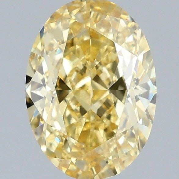 Loose Diamond - OVAL 1.03ct Fancy Vivid Yellow VS2: Loose Diamond - OVAL 1.03ct Fancy Vivid Yellow VS2 Source: This is a real non-mined Diamond that has been grown in a lab Shape: OVAL Carats: 1.03 Color: Fancy Vivid Yellow Certification: IGI Video: