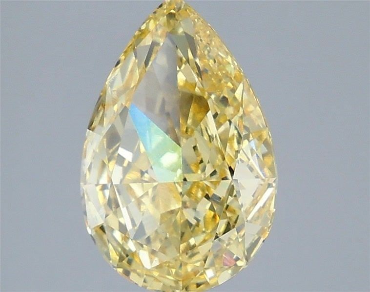 Loose Diamond - PEAR 3.08ct Fancy Vivid Yellow VS1: Loose Diamond - PEAR 3.08ct Fancy Vivid Yellow VS1 Source: This is a real non-mined Diamond that has been grown in a lab Shape: PEAR Carats: 3.08 Color: Fancy Vivid Yellow Certification: IGI Video: