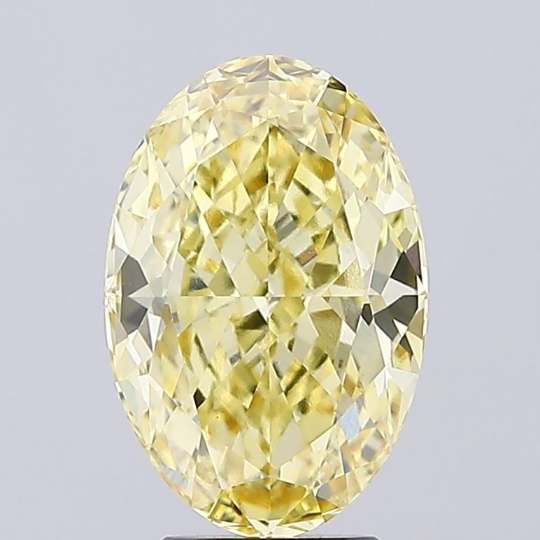 Loose Diamond - OVAL 4.04ct Fancy Vivid Yellow VVS2: Loose Diamond - OVAL 4.04ct Fancy Vivid Yellow VVS2 Source: This is a real non-mined Diamond that has been grown in a lab Shape: OVAL Carats: 4.04 Color: Fancy Vivid Yellow Certification: IGI Video: