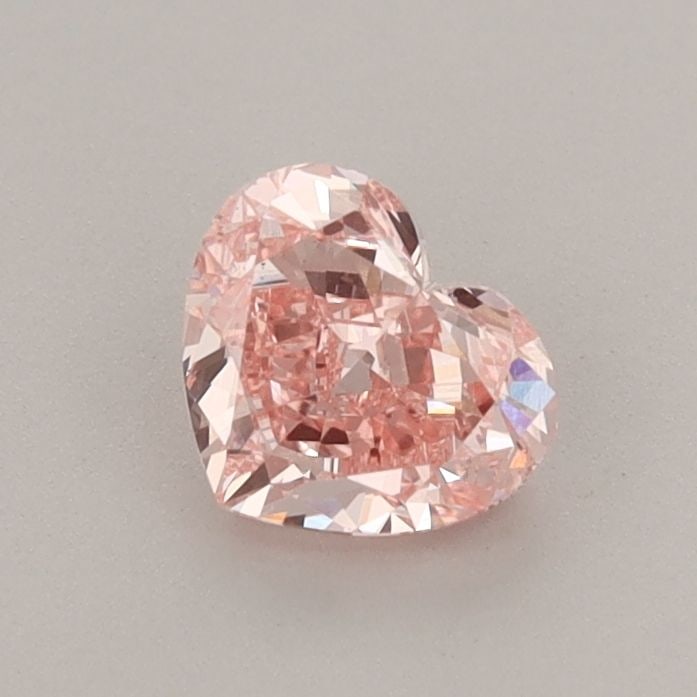 Loose Diamond - HEART 0.7ct Fancy Vivid Pink VS2: Loose Diamond - HEART 0.7ct Fancy Vivid Pink VS2 Source: This is a real non-mined Diamond that has been grown in a lab Shape: HEART Carats: 0.7 Color: Fancy Vivid Pink Certification: IGI Video: