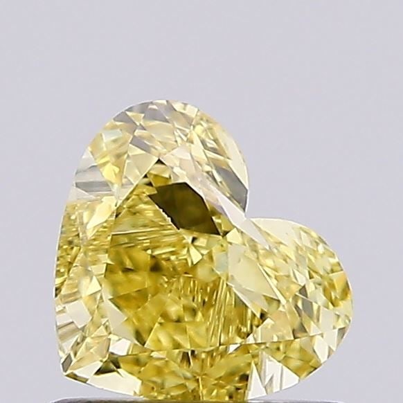Loose Diamond - HEART 0.79ct Fancy Vivid Yellow VVS2: Loose Diamond - HEART 0.79ct Fancy Vivid Yellow VVS2 Source: This is a real non-mined Diamond that has been grown in a lab Shape: HEART Carats: 0.79 Color: Fancy Vivid Yellow Certification: NONE Video